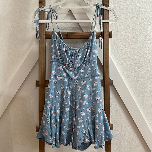 Red Dress Boutique Other - Baby blue floral romper